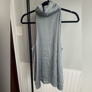 Sleeveless top- silver gray with pearl embellishment.